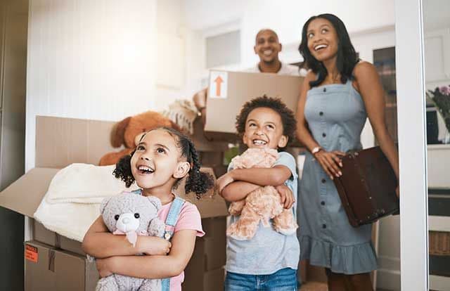 Family looking inside new home