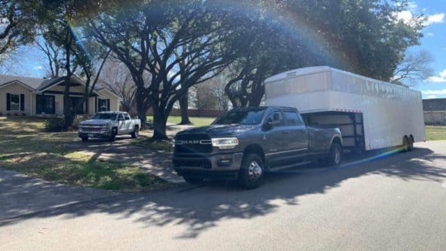 Moving truck in front of home